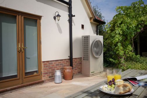 Dimplex heat pump outside back of house