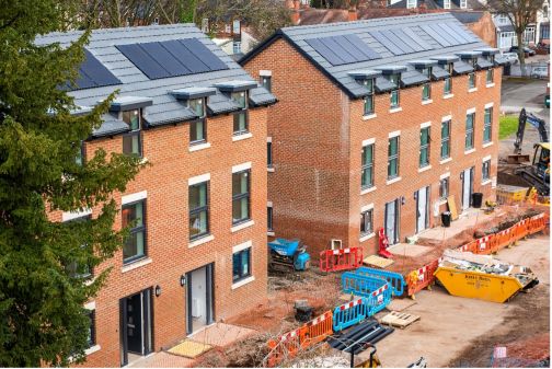 houses under construction on construction site