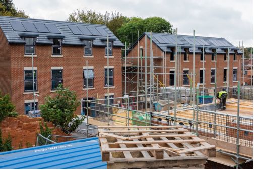 houses under construction on construction site