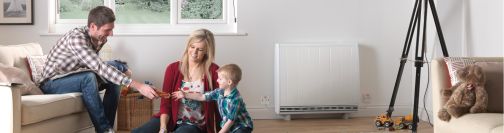 Dimplex quantum heater in living room beside mother, father and child
