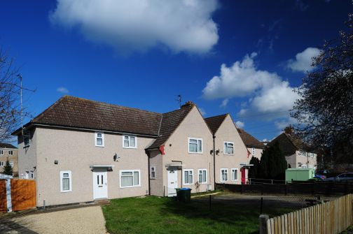 View of front of a house and garden