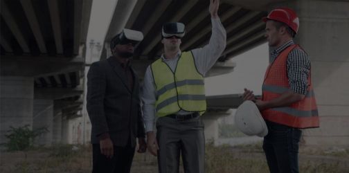 construction worker with businessman and engineer wearing VR headsets
