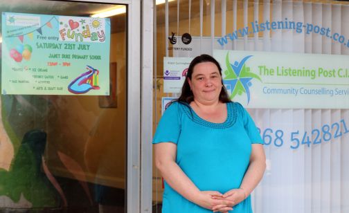 woman stood outside basildon listening post 