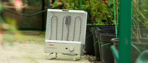 MPH portable heater in a garden next to plants