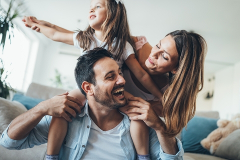 family happily playing