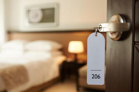 key opening hotel room door