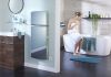 dimplex mirrored panel heater bathroom towel rack with woman in background